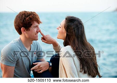 Couple in Ondarreta Wall, Donostia, San Sebastian, Gipuzkoa, Euskadi, Spain View Large Photo Image Stock Image - Couple in Ondarreta Wall, Donostia, San Sebastian, Gipuzkoa, Euskadi, Spain. Fotosearch