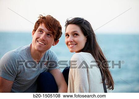 Stock Photo - Couple in Ondarreta Wall, Donostia, San Sebastian, Gipuzkoa, Euskadi, Spain. Fotosearch
