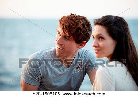 Couple in Ondarreta Wall, Donostia, San Sebastian, Gipuzkoa, Euskadi, Spain View Large Photo Image Stock Photography - Couple in Ondarreta Wall, Donostia, San Sebastian, Gipuzkoa, Euskadi, Spain. Fotosearch