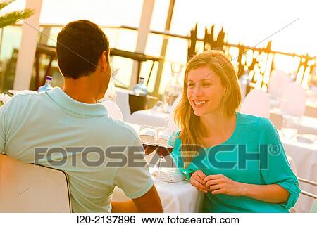 Couple in outdoor restaurant View Large Photo Image Stock Photograph - Couple in outdoor restaurant. Fotosearch