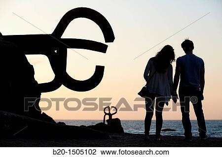 Couple in Peine del viento, by Eduardo Chillida, Donostia, San Sebastian, Gipuzkoa, Euskadi, Spain View Large Photo Image Stock Image - Couple in Peine del viento, by Eduardo Chillida, Donostia, San Sebastian, Gipuzkoa, Euskadi, Spain. Fotosearch