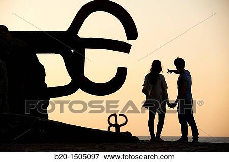 Couple in Peine del viento, by Eduardo Chillida, Donostia, San Sebastian, Gipuzkoa, Euskadi, Spain View Large Photo Image Stock Photo - Couple in Peine del viento, by Eduardo Chillida, Donostia, San Sebastian, Gipuzkoa, Euskadi, Spain. Fotosearch