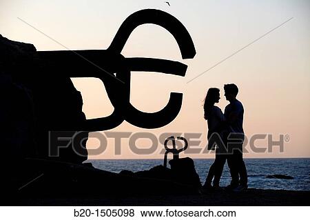 Couple in Peine del viento, by Eduardo Chillida, Donostia, San Sebastian, Gipuzkoa, Euskadi, Spain View Large Photo Image Stock Photo - Couple in Peine del viento, by Eduardo Chillida, Donostia, San Sebastian, Gipuzkoa, Euskadi, Spain. Fotosearch