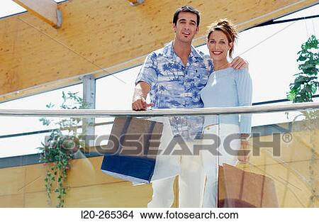 Picture - Couple in shopping center. Fotosearch