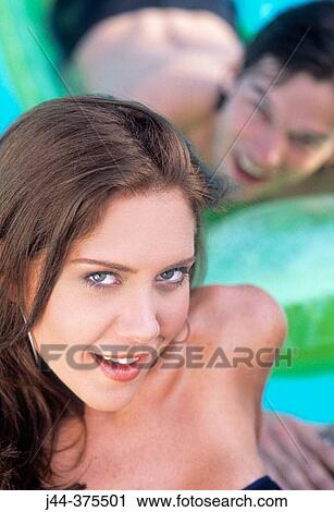 Couple in the pool View Large Photo Image Stock Image - Couple in the pool. Fotosearch