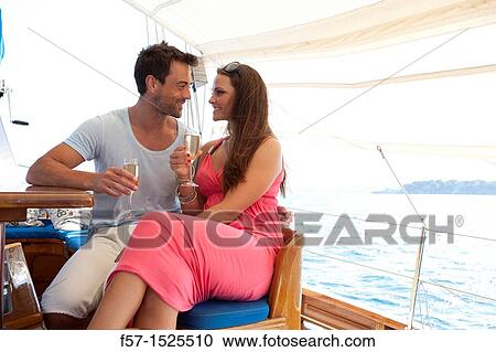 Couple in yacht View Large Photo Image Stock Image - Couple in yacht. Fotosearch