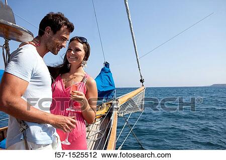 Couple in yacht View Large Photo Image Stock Image - Couple in yacht. Fotosearch