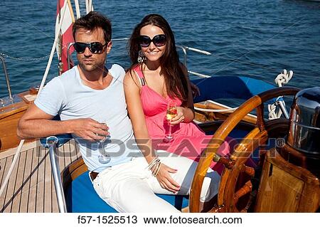 Couple in yacht View Large Photo Image Stock Image - Couple in yacht. Fotosearch