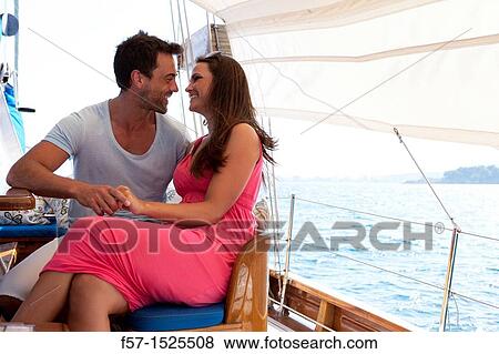 Couple in yacht View Large Photo Image Stock Photo - Couple in yacht. Fotosearch