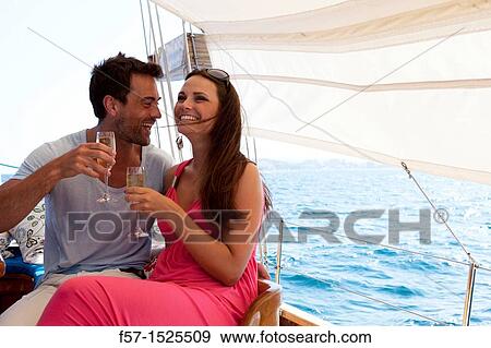 Stock Photo - Couple in yacht. Fotosearch
