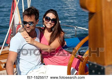 Couple in yacht View Large Photo Image Stock Photo - Couple in yacht. Fotosearch