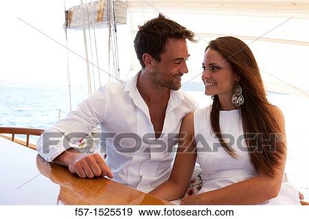 Couple in yacht View Large Photo Image Stock Photo - Couple in yacht. Fotosearch