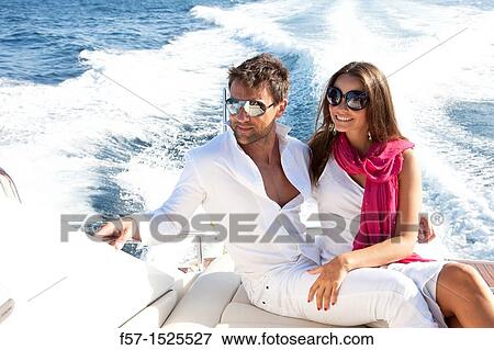 Couple in yacht View Large Photo Image Stock Photo - Couple in yacht. Fotosearch