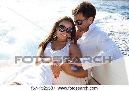Couple in yacht View Large Photo Image Stock Photo - Couple in yacht. Fotosearch