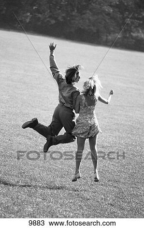 Couple jumping View Large Photo Image Stock Image - Couple jumping. Fotosearch