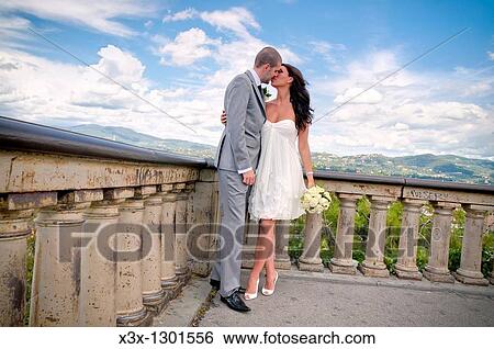 Couple just married at Piazzale Michelangelo in Florence Italy View Large Photo Image Stock Photograph - Couple just married at Piazzale Michelangelo in Florence Italy. Fotosearch