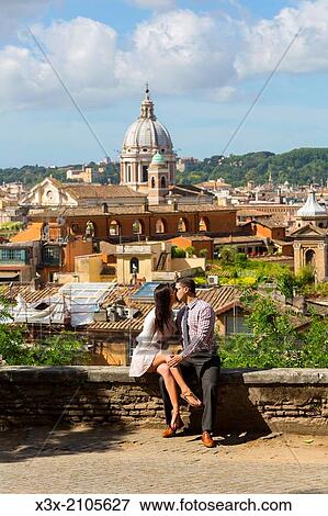 Stock Photo - Couple kissing in Rome, Italy.. Fotosearch