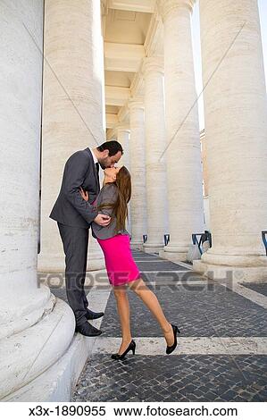 Couple kissing in the colonnade of Saint Peter's cathedral Vatican Rome Italy View Large Photo Image Stock Photography - Couple kissing in the colonnade of Saint Peter's cathedral Vatican Rome Italy. Fotosearch