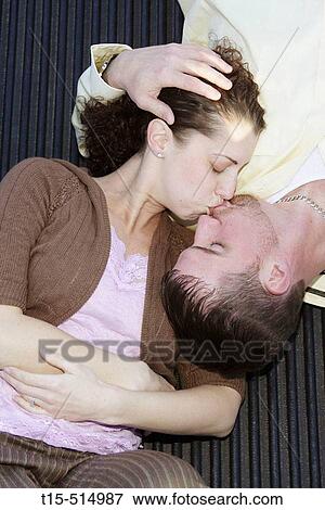 Couple kissing on the pickup truck bed View Large Photo Image Stock Photo - Couple kissing on the pickup truck bed. Fotosearch