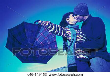 Stock Image - Couple kissing. Fotosearch