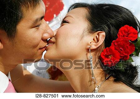 Stock Image - Couple Kissing. Fotosearch
