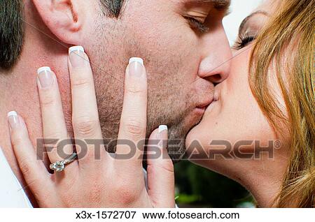 Couple kissing View Large Photo Image Stock Photo - Couple kissing. Fotosearch