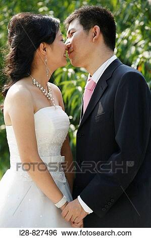 Couple Kissing Wedding View Large Photo Image Stock Photograph - Couple Kissing Wedding. Fotosearch