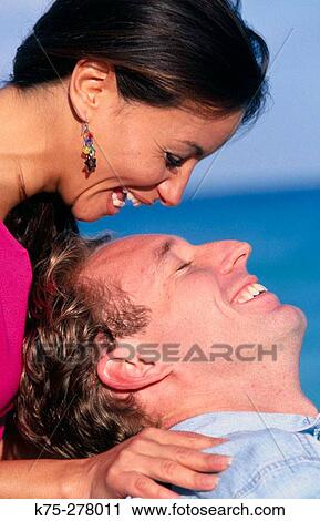 Stock Image - Couple laughing. Fotosearch