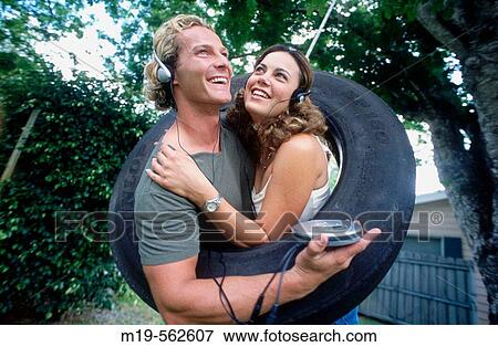 couple listening to music View Large Photo Image Stock Photo - couple listening to music. Fotosearch