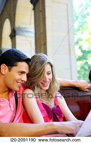 Couple looking at menu in the restaurant. San Sebastian. Donostia. Gipuzkoa. Basque Country. Spain. View Large Photo Image Stock Image - Couple looking at menu in the restaurant. San Sebastian. Donostia. Gipuzkoa. Basque Country. Spain.. Fotosearch