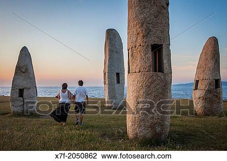 Couple, Menhires by Manolo Paz, Corua city, Galicia, Spain. View Large Photo Image Stock Image - Couple, Menhires by Manolo Paz, Corua city, Galicia, Spain.. Fotosearch