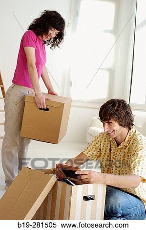 Couple moving home View Large Photo Image Stock Photography - Couple moving home. Fotosearch