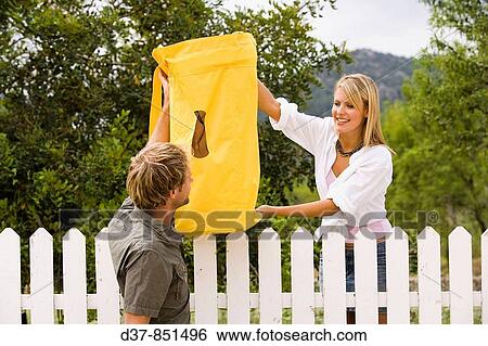 Couple moving house happy View Large Photo Image Stock Photograph - Couple moving house happy. Fotosearch