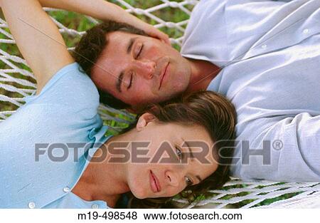 couple on a hammock View Large Photo Image Stock Photo - couple on a hammock. Fotosearch