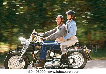 couple on a motorcycle View Large Photo Image Stock Photo - couple on a motorcycle. Fotosearch