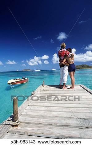 couple on a pontoon in Mayreau, Grenadines islands, Saint Vincent and the Grenadines, Winward Islands, Lesser Antilles, Caribbean Sea View Large Photo Image Stock Image - couple on a pontoon in Mayreau, Grenadines islands, Saint Vincent and the Grenadines, Winward Islands, Lesser Antilles, Caribbean Sea. Fotosearch