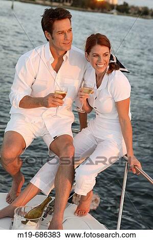 Couple on a sunset cruise View Large Photo Image Stock Image - Couple on a sunset cruise. Fotosearch