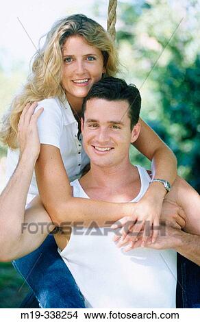 couple on a tire swing View Large Photo Image Picture - couple on a tire swing. Fotosearch