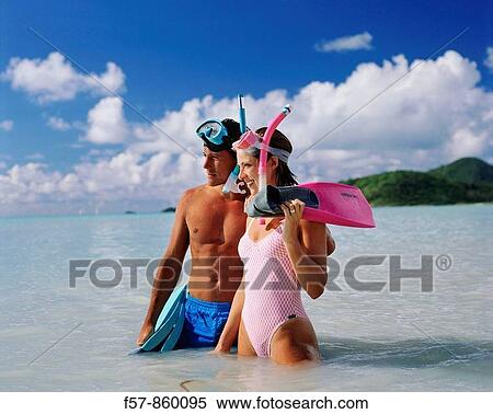 Couple on a tropical beach in the Caribbean View Large Photo Image Stock Photography - Couple on a tropical beach in the Caribbean. Fotosearch