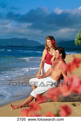 Couple on Beach, Kauai, Hawaii View Large Photo Image Stock Photography - Couple on Beach, Kauai, Hawaii. Fotosearch