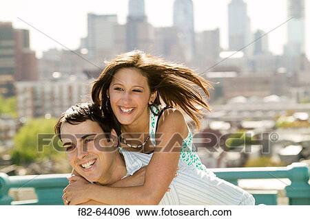 Couple on Benjamin Franklin Bridge. Philadelphia. Pennsylvania. USA. View Large Photo Image Stock Photograph - Couple on Benjamin Franklin Bridge. Philadelphia. Pennsylvania. USA.. Fotosearch