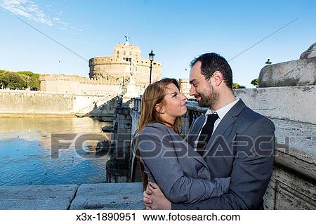 Couple on bridge Castel sant? Angelo Rome Italy View Large Photo Image Stock Image - Couple on bridge Castel sant? Angelo Rome Italy. Fotosearch