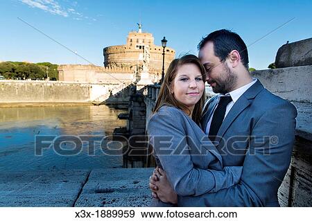 Couple on bridge Castel sant? Angelo Rome Italy View Large Photo Image Stock Photo - Couple on bridge Castel sant? Angelo Rome Italy. Fotosearch