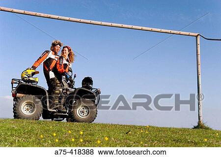 Couple on quad View Large Photo Image Stock Photo - Couple on quad. Fotosearch