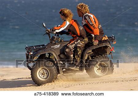 Couple on quad View Large Photo Image Stock Photo - Couple on quad. Fotosearch