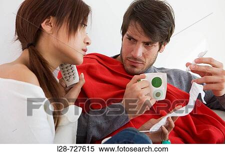 Couple on sofa View Large Photo Image Stock Photography - Couple on sofa. Fotosearch