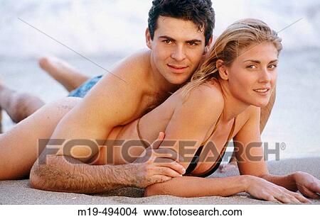 couple on the beach View Large Photo Image Picture - couple on the beach. Fotosearch