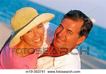Couple on the beach View Large Photo Image Stock Image - Couple on the beach. Fotosearch