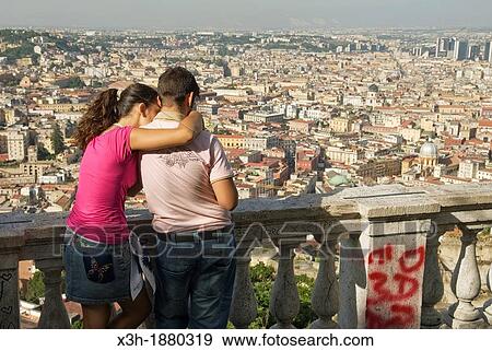 couple on the belvedere of San Martino looking at the historic center, Naples, Campania region, southern Italy, Europe View Large Photo Image Stock Photo - couple on the belvedere of San Martino looking at the historic center, Naples, Campania region, southern Italy, Europe. Fotosearch