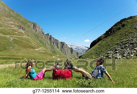 Couple on the mountain. Italy, Piedmont Alps, Formazza Valley. View Large Photo Image Picture - Couple on the mountain. Italy, Piedmont Alps, Formazza Valley.. Fotosearch